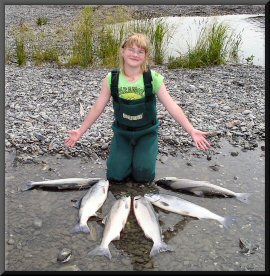 Keeli Telleen with a limit of Chrome Sockeye Salmon.