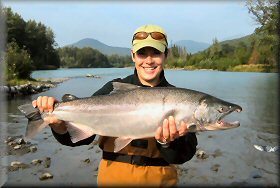 Carrie with a bright Kenai River Silver Salmon.