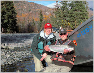 Pulling into Jim's Landing with one more Kenai River Rainbow.