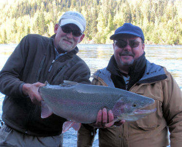 Chris with a 32 inch Alaska Rainbow